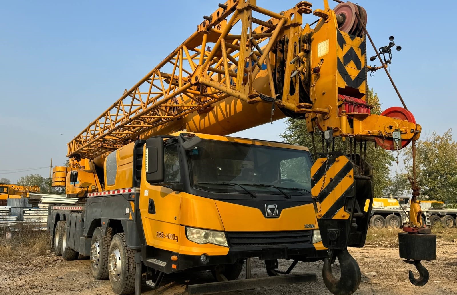 Crane lifting heavy machinery